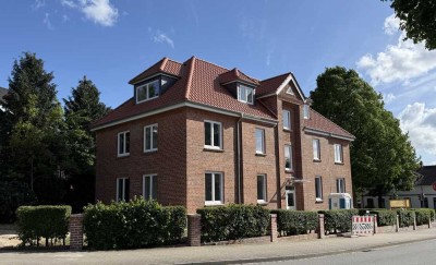 Erstbezug: Charmante Wohnung mit Terrasse, Garten und PKW-Stellplatz