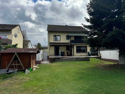 TOP! 2-3 Familienhaus mit großem Garten in schöner Wohnlage!