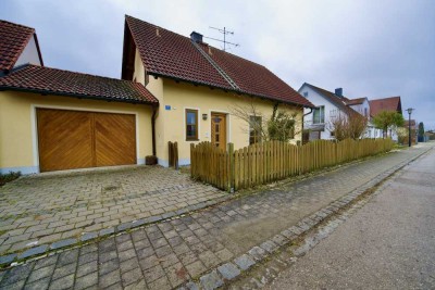 Familienfreundliches Einfamilienhaus mit schönem Garten und Garage in ruhiger Lage