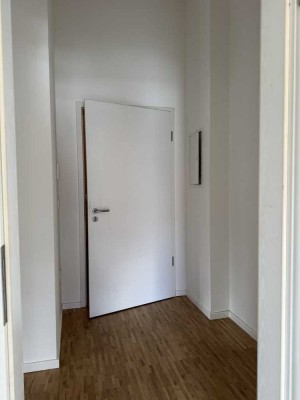 2 Zimmer Staffelgeschoss-Wohnung mit Echtholzparkett und Fußbodenheizung inkl. TG-Stellplatz