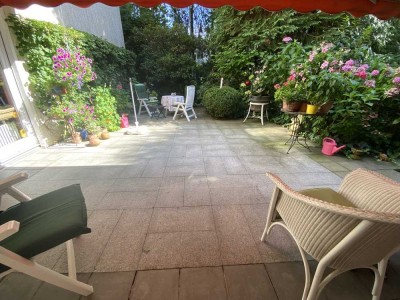 Idyllische Erdgeschosswohnung mit gr. Terrasse und zusätzlicher Dachstudiowg.