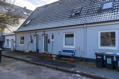 Preisreduzierung! Vermietetes Reihenendhaus mit Garten in Innenstadtnähe