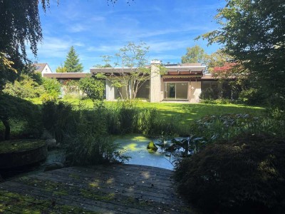 Südstadtflair :  Bungalow mit idyllischem Garten und Innenpool