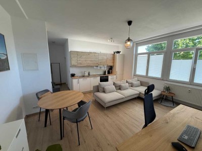 Möblierte, helle 1 ZKB Erdgeschosswohnung