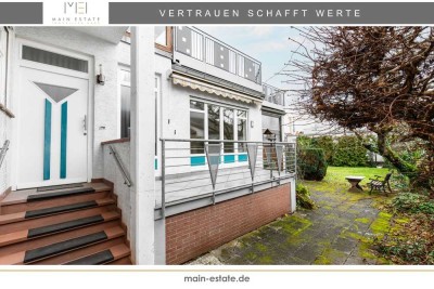 Wohnen mit Charakter: Zweifamilienhaus mit Gartenparadies und Gestaltungsfreiheit in Dreieich