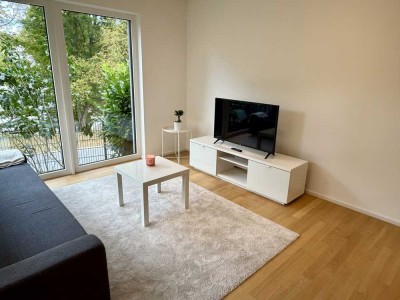 Exklusive, komplett möblierte 2-Zimmer-Wohnung mit eigenem Garten und Terrasse