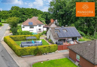 Großzügiges Einfamilienhaus mit Garten, Pool und Potenzial