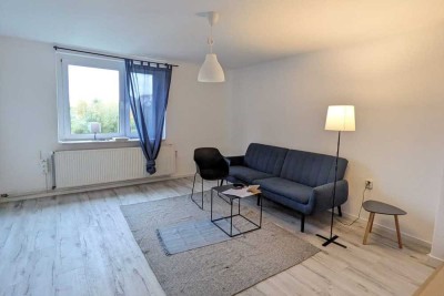 Renditepaket in Süderholz: 2 3-Zi.-Wohnungen + Garagen, Garten & Bungalow