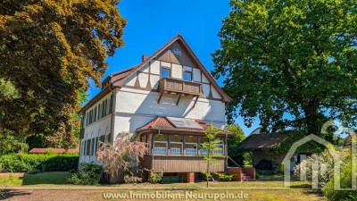 großzügige Wohnung mit Gartenteil und Einstellplätzen in ruhiger und beliebter Lage