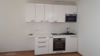 Exklusive, neuwertige 1-Zimmer-Erdgeschosswohnung mit geh. Innenausstattung mit Balkon und EBK