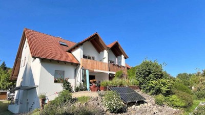 Attraktive 4 Zimmer Eigentumswohnung über zwei Etagen mit Süd-West-Balkon und großem Gartenanteil