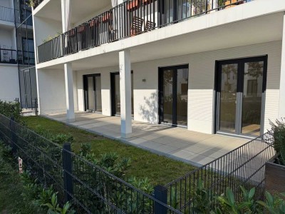 Wunderbare Gartenwohnung mit 4 Zimmern, EBK, Terrasse,  und 2 TG-Stellplätzen