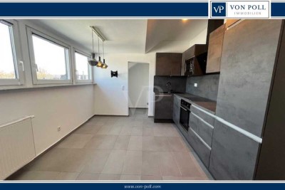 Modernisierte Wohnung im 1. Obergeschoss mit Balkon