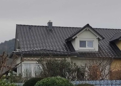 Doppelhaushälfte mit großem Garten in Siedlungslage