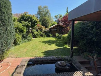 Zentral gelegene Wohlfühloase mit Garten und Balkon