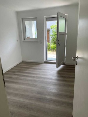 Modernes Appartement mit Terrasse und Garten