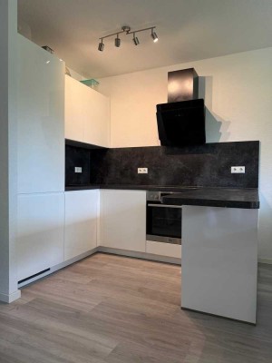 Moderne 2-Zimmer Wohnung mit Einbauküche und Tiefgaragenplatz