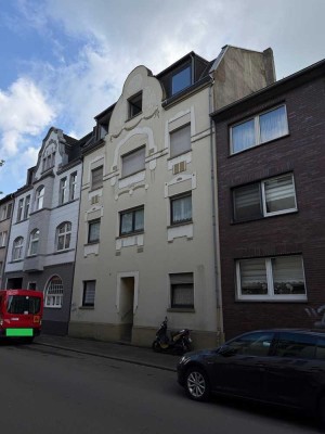 Laar am Rhein: ... solides 5-Fam.-Haus mit Mietsteigerungspotential!