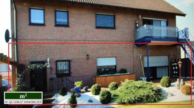 Erdgeschosswohnung mit Garten und Carport