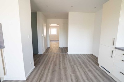Erstbezug: Kernsanierte 3-Zimmer Wohnung mit Gäste-WC und Balkon - Familien & WG geeignet