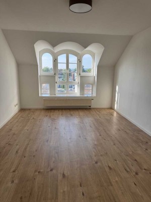 Apartment  in denkmalgeschützem MFH in zentraler Lage