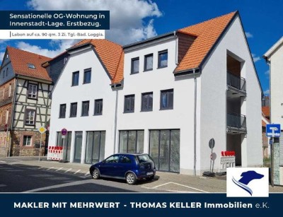Zentral wohnen in modernem Neubau. Erstbezug. Mit Loggia.