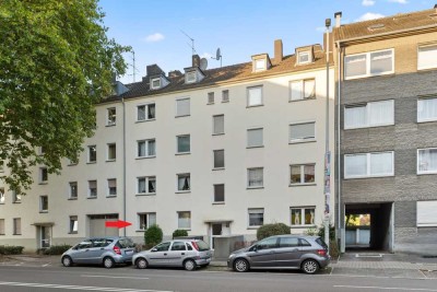 Mitten in der City: modernisierte 3-Zimmer-Hochparterre mit grüner Oase