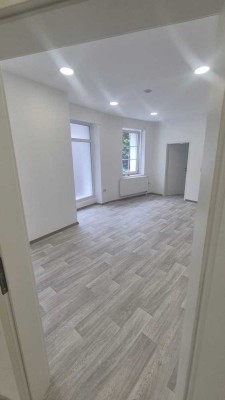 Erstbezug nach Sanierung: Stilvolle 3-Zimmer-Erdgeschosswohnung mit geh. Innenausstattung