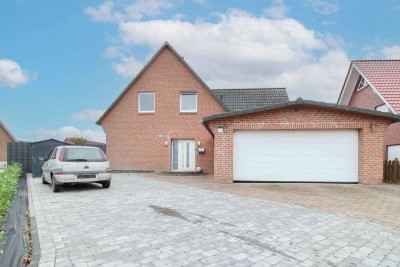 Familientraum mit Garten und Komfort – gepflegtes Einfamilienhaus mit PV-Anlage und Doppelgarage