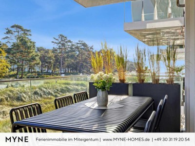 Ferienimmobilie in Miteigentum: Maisonette-Wohnung in erster Meereslinie mit Sauna, Kamin, Pool