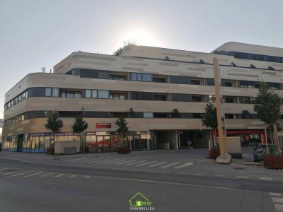 Lichtdurchflutete, moderne 2 Zimmer Wohnung mit Terrasse und 2 Tiefgaragenplätze