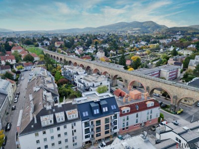 Erstbezug nach Errichtung | südseitige 2-Zimmerwohnung mit Balkon in ruhigen Innenhof | optionale Tiefgaragenplätze | Luftwärmepumpe