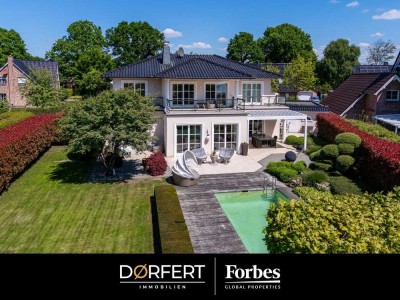 Ein Sommertag, der nie endet: Ihre Villa mit Pool, Gartenparadies und Lebensfreude pur.