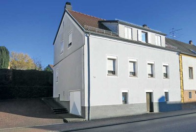 Stadtnahe Doppelhaushälfte mit grünem Rückzugsort