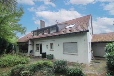 Kapitalanleger aufgepasst: Renditeobjekt mit Einliegerwohnung und großem Garten