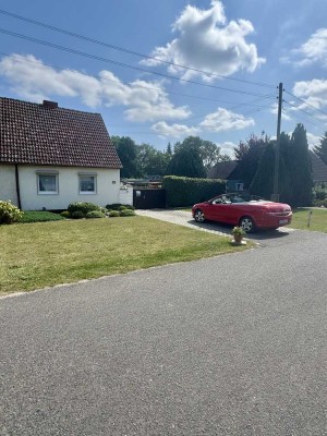 Doppelhaushälfte, großer Garten und viel Potential in ruhiger Lage