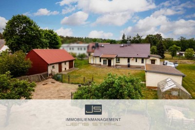 Einfamilienhaus mit großem Grundstück, Nebengelass und Ausbaureserve