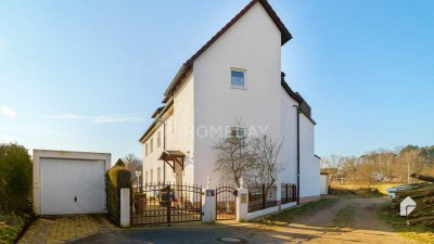 Attraktives Mehrfamilienhaus mit 3 Wohneinheiten, Dachterrasse und Wintergarten in Stein