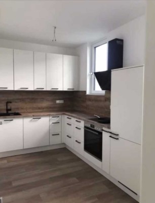 Neuwertige 2-Zimmerwohnung mit Terrasse und kleinem Gartenstück