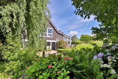 Zwei Häuser, viele Möglichkeiten – großzügiges Immobilienensemble in ruhiger Lage von Neuenkirchen