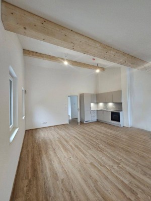 Neue 68 m² Dachgeschosswohnung mitten in Wals!
