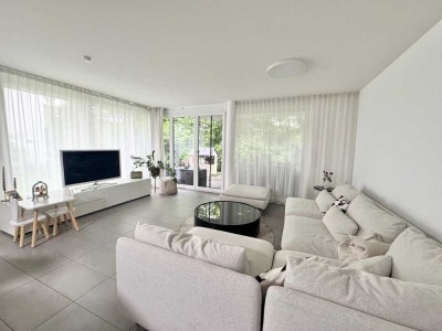 moderne 3 Zimmer-Terrassenwohnung mit privaten Garten