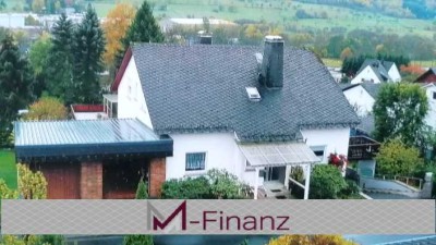Wunderschönes Einfamilienhaus mit Einliegerwohnung*Garagen*Garten*ruhige Lage