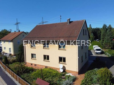 Vielseitiges Mehrfamilienhaus mit angrenzendem  Baugrundstück in Herlikofen