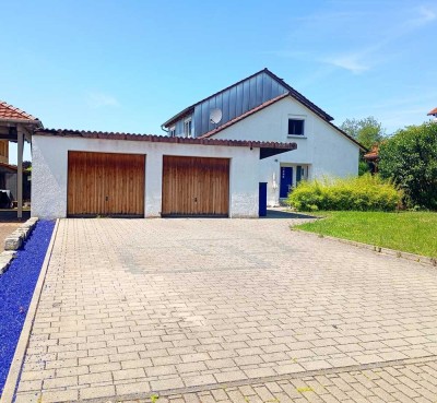 Perfekt für Familien und Kapitalanleger! Immobilie mit viel Potential in sehr ruhiger Lage