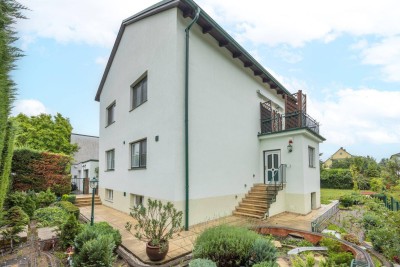 Charmantes Einfamilienhaus mit großem Garten, Pool &amp; Top-Zustand in begehrter Lage von Strebersdorf