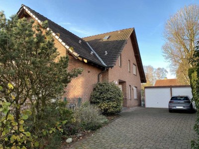 147 qm I Stilvolle, ruhige 3,5-Zimmer-Wohnung mit Kamin und Garten in guter Lage