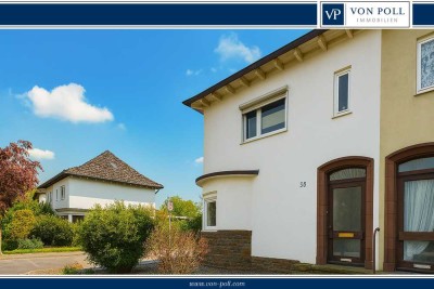 Charmante Doppelhaushälfte mit Südgarten und Carport