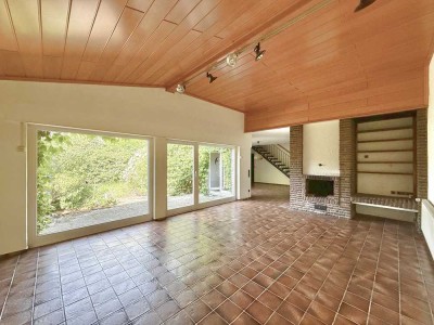 Individuelles & großzügiges Architektenreihenhaus mit schönem Garten in beliebter Lage