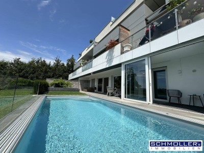 Wohnen wie im Bungalow - Exklusive Gartenwohnung mit Pool und grandioser Aussicht